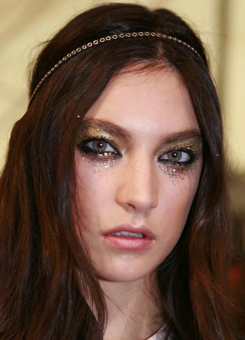 Smudgy glitter glam rock makeup at DSquared2 Spring/Summer 2012