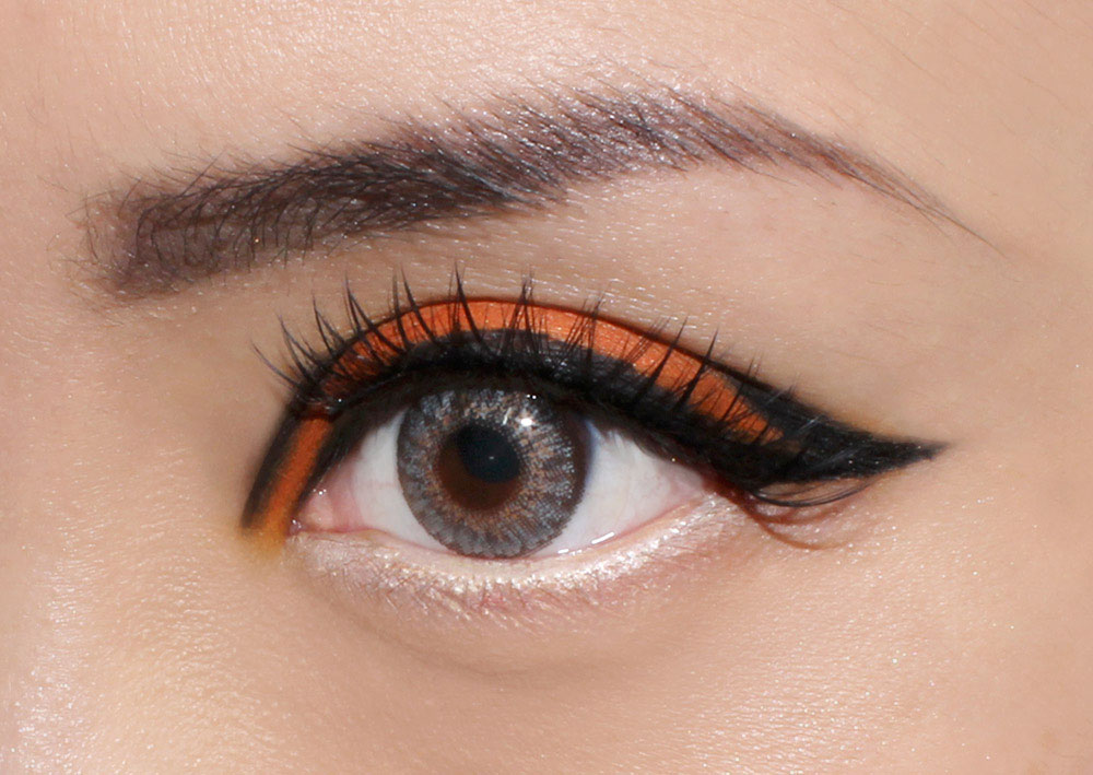 Graphic Orange Eye face of the day