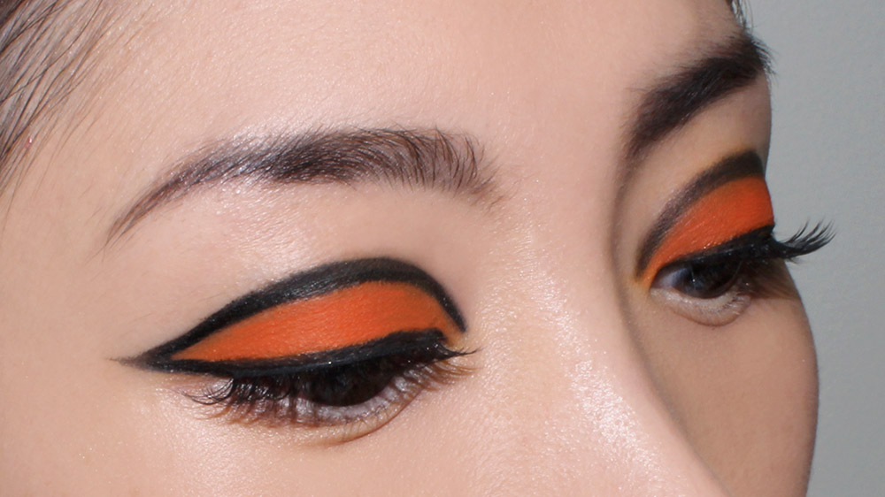 Graphic Orange Eye and Nude Lips Makeup Look