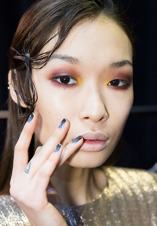 Plum and yellow eye makeup at Christian Siriano A/W 2015